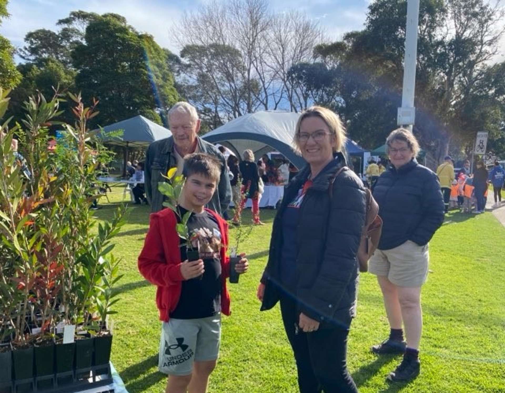 Happy locals with their free plant